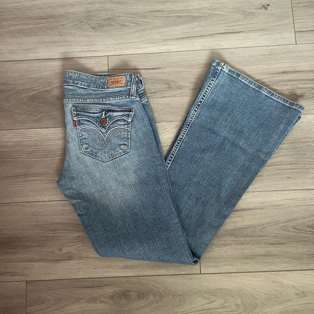 Vintage Women’s Levi’s Light Blue Wash Too Super-low  524 flared jeans (5 m)